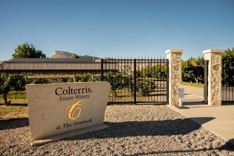 Colterris at The Overlook Stone Sign. Wrought Iron Gate, and Brass C's - Palisade Colorado Winery
